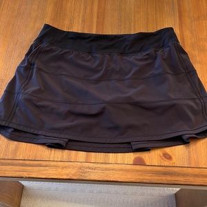 Black pace rival mid rise skirt